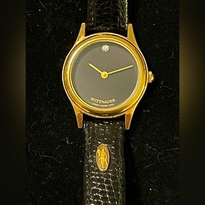 Wittnauer ladies luxury watch. Diamond 12 hour, gold plated leather band